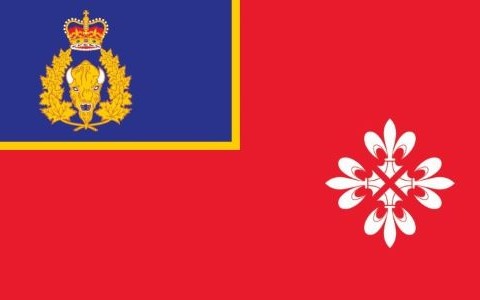 Les quatre fleurs de lys stylisées forment une croix ou une rose des vents, symbole de l'étendue des responsabilités du quartier général de la Division et des quatre coins du Québec. Les fleurs de lys proviennent des armoiries royales de France, qui sont reprises des armoiries du Canada.