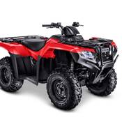 Image générique d’un VTT rouge de marque Honda (modèle TRX420).